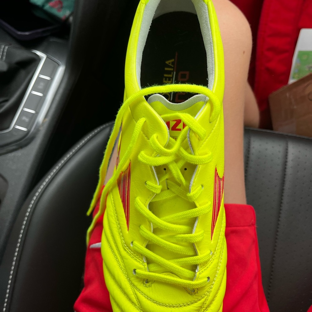 Yellow Soccer Cleats with Red Accents